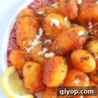 Fiery Lebanese Potatoes 7 A plate of food, with feta and Potato