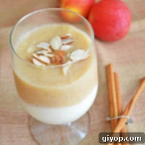 A cup with apple and milk pudding.