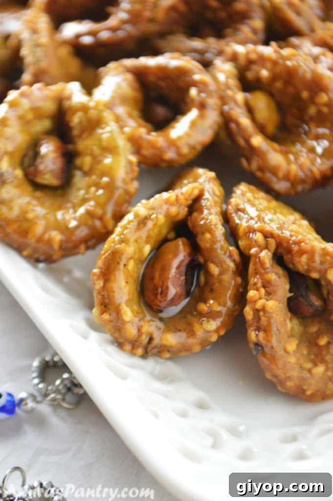 A closer look on a white platter filled with matcha babouche cookies