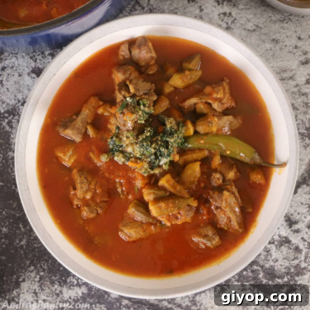 A big bowl of bamya on a concrete countertop