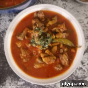 A big bowl of bamya on a concrete countertop