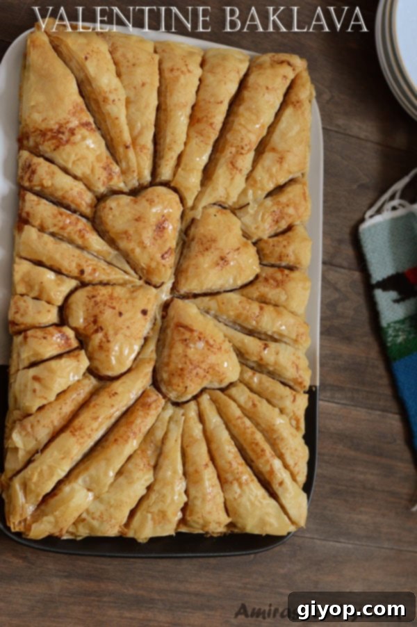 Photo showing beautifully arranged Baklava hearts and slices on a plate, ready to be served.