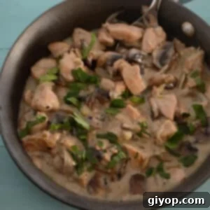 Creamy Mushroom Chicken 2 A skillet with chicken and mushroom.