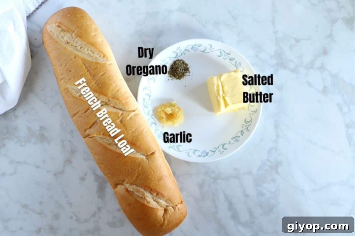 Garlic bread ongredients on a marble white table ready for the air fryer.