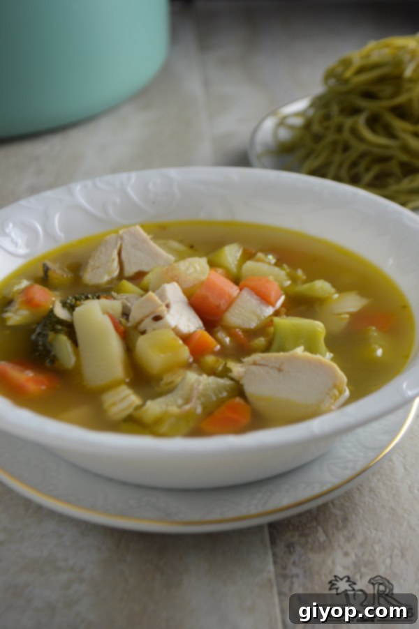 Friday's Leftover Comfort 3 A close-up of a steaming bowl of homemade leftover soup, highlighting fresh ingredients.