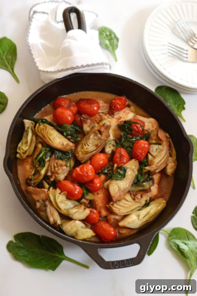 Effortless Meal Planning 4 A pot filled with savory Lemon Artichoke Chicken, ready to be served.