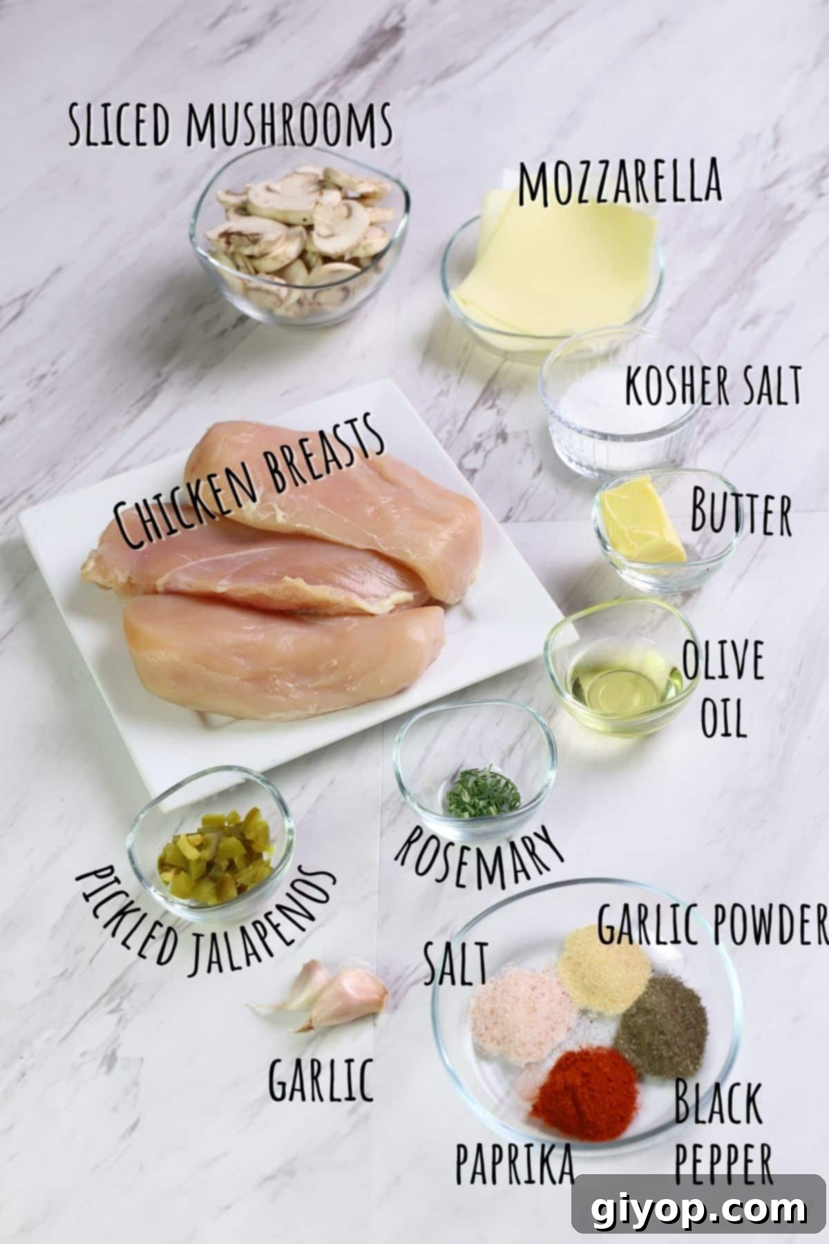 Recipe ingredients on a white marble surface.