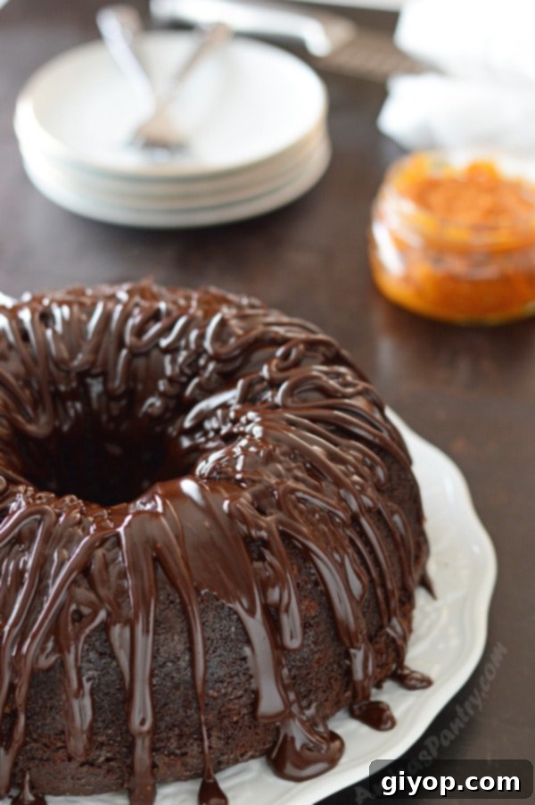 A rich chocolate pumpkin bundt cake, beautifully decorated and ready to be served.