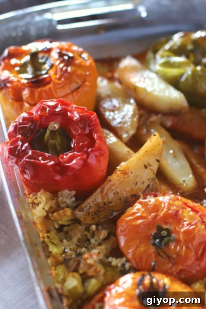 46 Smart Meal Solutions 2 A vibrant platter of Greek Gemista, featuring beautifully stuffed peppers and tomatoes, baked to perfection with aromatic herbs and rice.