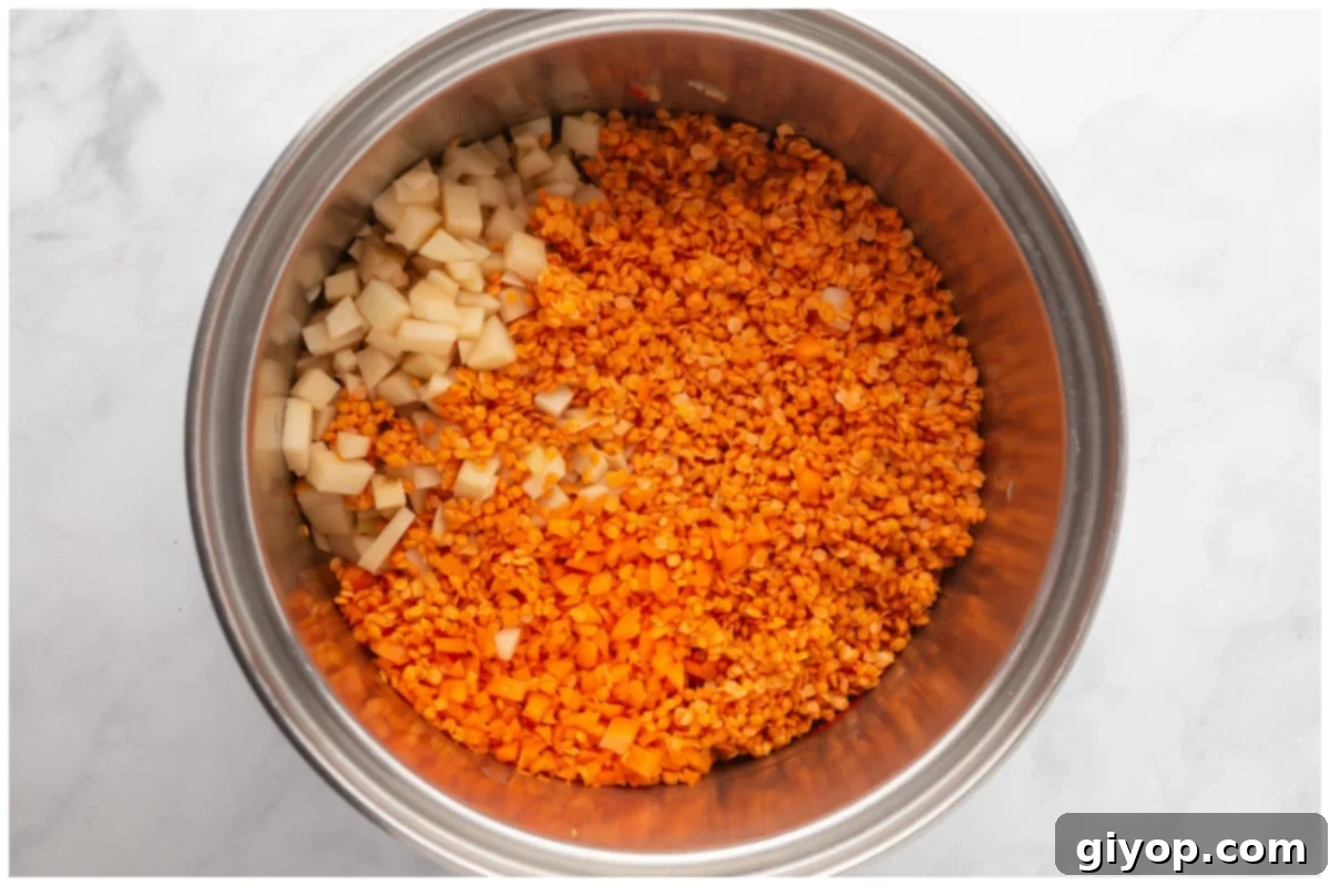 A pot with soup ingredients.