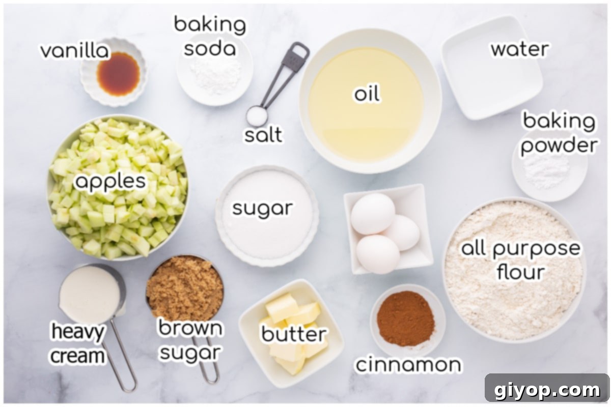 All the necessary ingredients for making the apple bundt cake laid out on a clean kitchen counter.