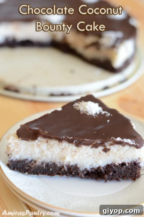 A perfectly sliced piece of homemade Bounty cake, showcasing its distinct layers of brownie, coconut, and chocolate, resting on a white plate on a rustic wooden surface, ready to be enjoyed.