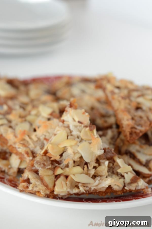 A close-up of a plate of food, with Caramel Heavenlies generously topped with nuts