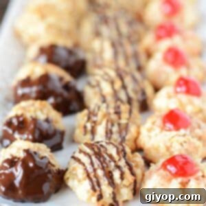 coconut macaroons served on a white serving platter.