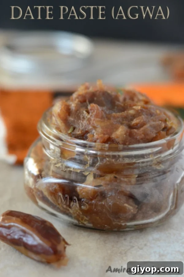 A close up of food in a jar with date paste, symbolizing the rich texture of Agwa