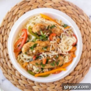 Top view of chicken scampi on a platter.