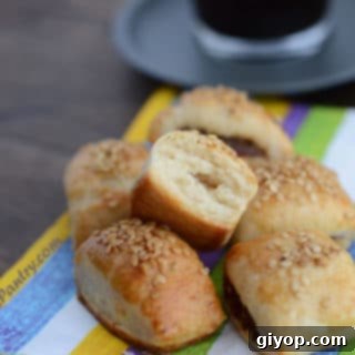 A plate of food with colored towel and cookies