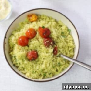 An overhead view of a plate with pesto couscous.