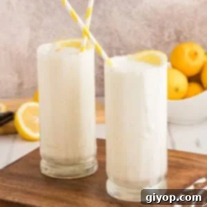 Whipped Lemonade in a glass with lemon slices