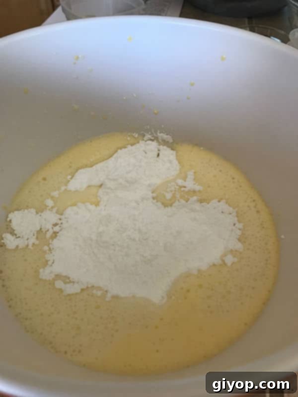 Caramelized Milk Powder Cake 6 A bowl of food with mixtures