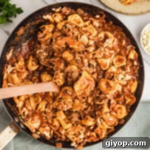 Hearty Beef Tortellini 2 An overhead image of a skillet with tortellini bake.