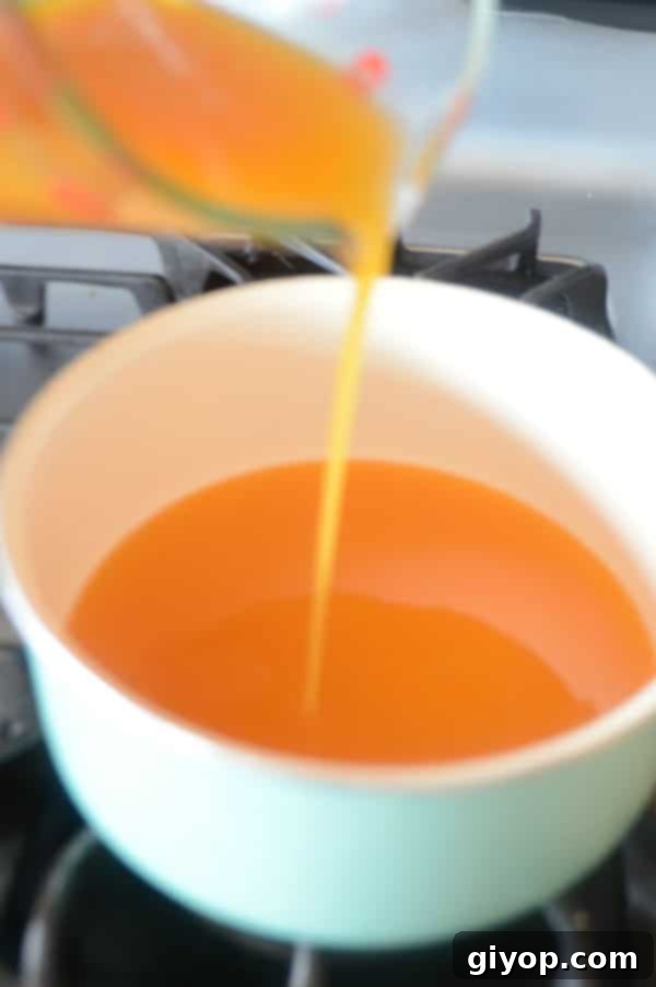 Sun-Dried Apricot Qamar Al-Deen Pudding 5 A close up of a bowl of apricot juice