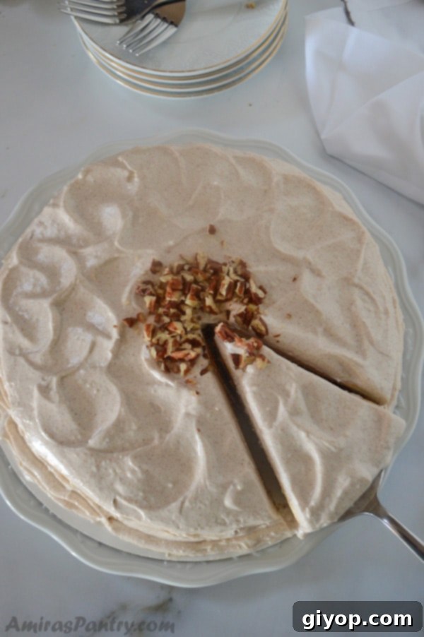 Close-up of a perfectly baked homemade cinnamon cake, showcasing its beautiful layers and inviting texture.