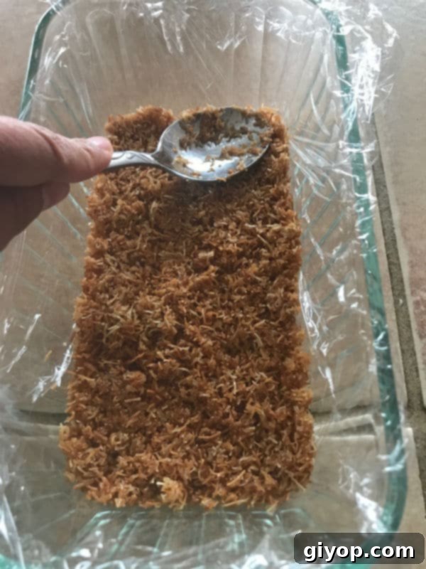 Tricolor Ice Cream Knafeh Delight 7 A mixture of knafeh in a glass pan for the base layer