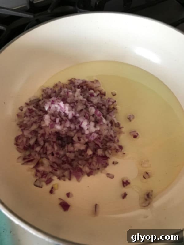 Simple 5-Ingredient Zucchini Vegan Delight 3 A bowl of oil and onions