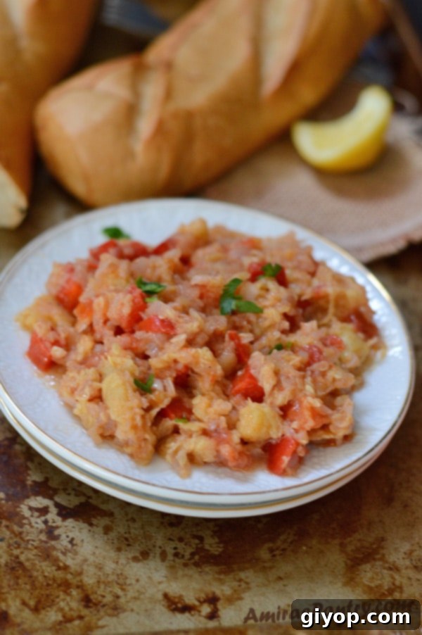 Simple 5-Ingredient Zucchini Vegan Delight 10 A plate of food on a table, with Zucchini and vegetables