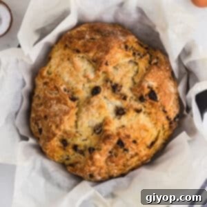 Irish Bread on a parchment lined skillet.