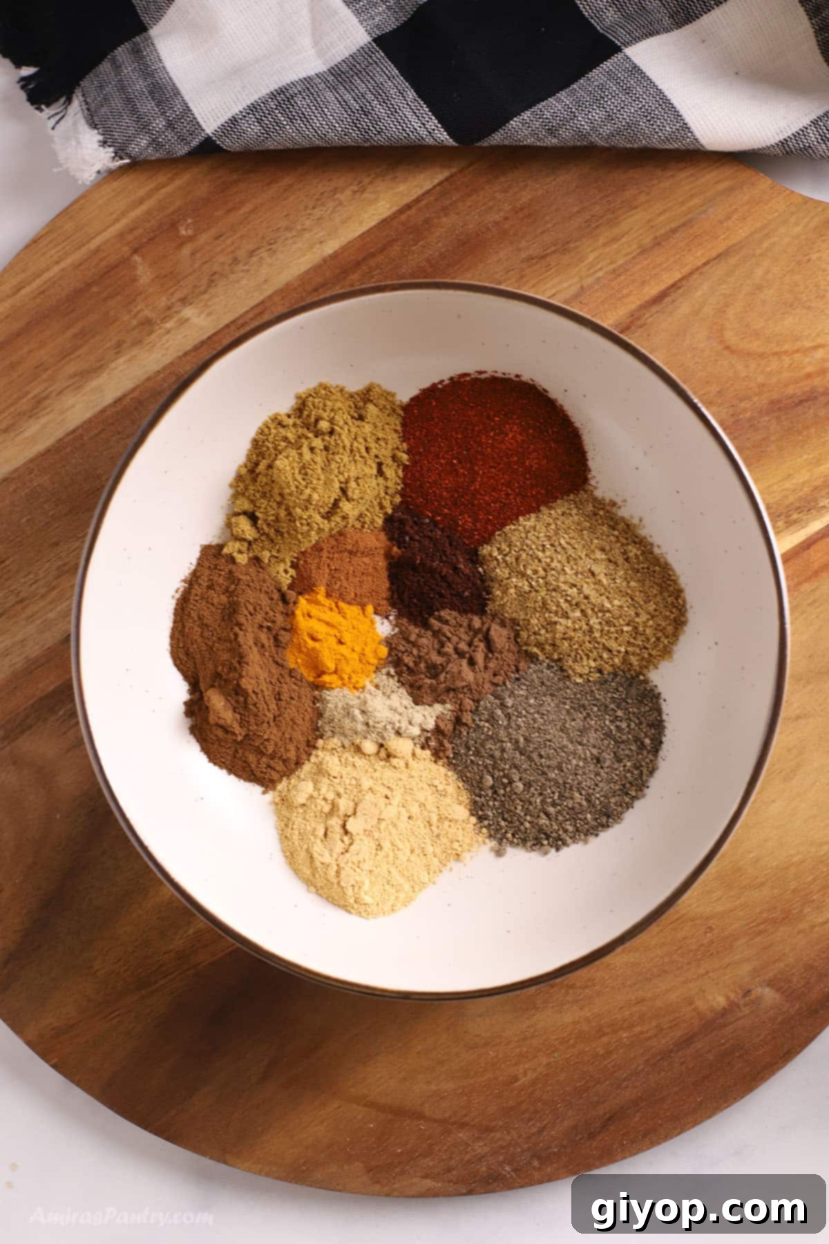 A big plate with shawarma spice mix ingredeints.