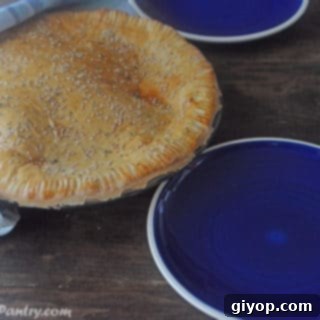 A plate of food on a table with bread