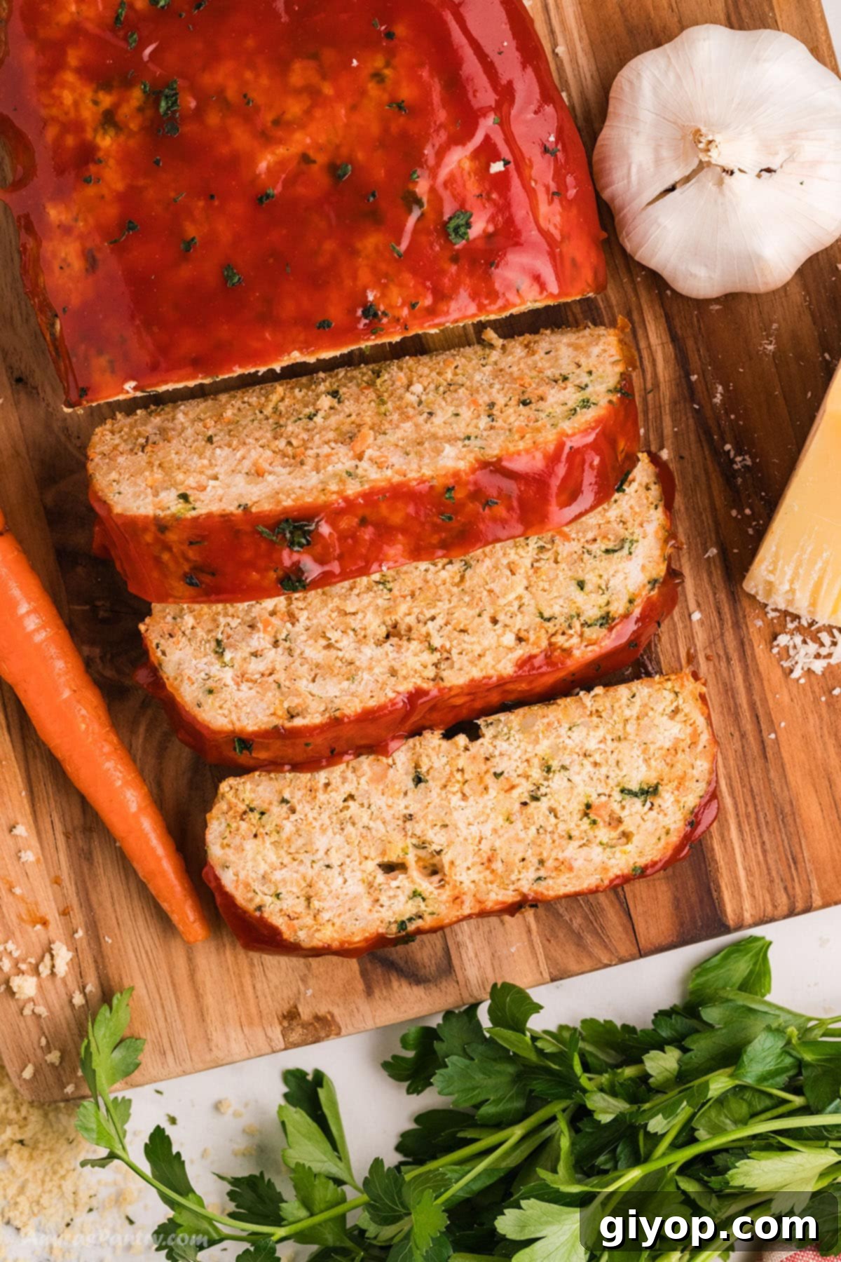 Hearty Chicken Meatloaf 2 A perfectly sliced chicken meatloaf with a rich glaze, ready to be served.