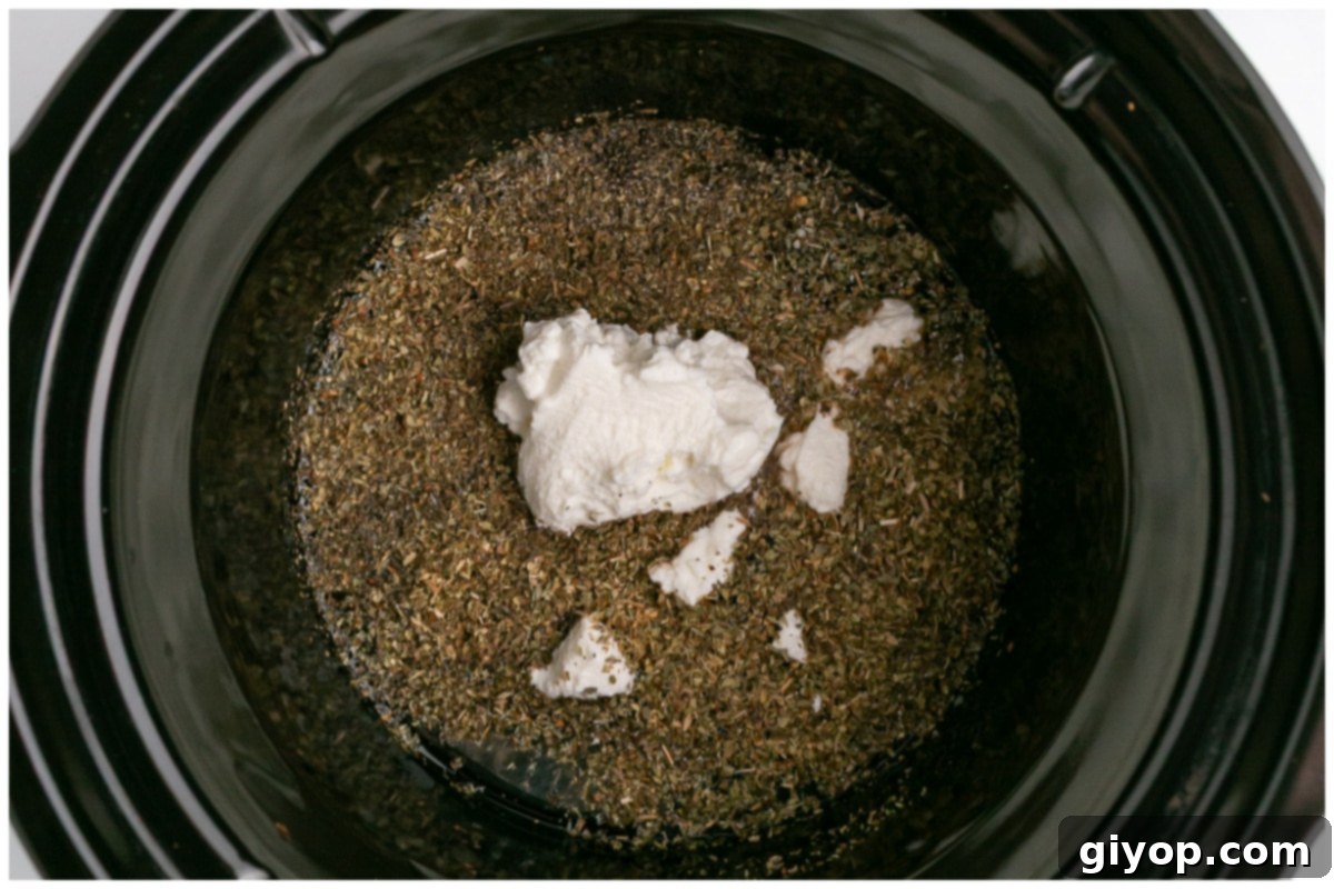 Set-It-and-Forget-It Chicken Gyros 6 Slow cooker containing a vibrant and aromatic mixture of marinade ingredients.