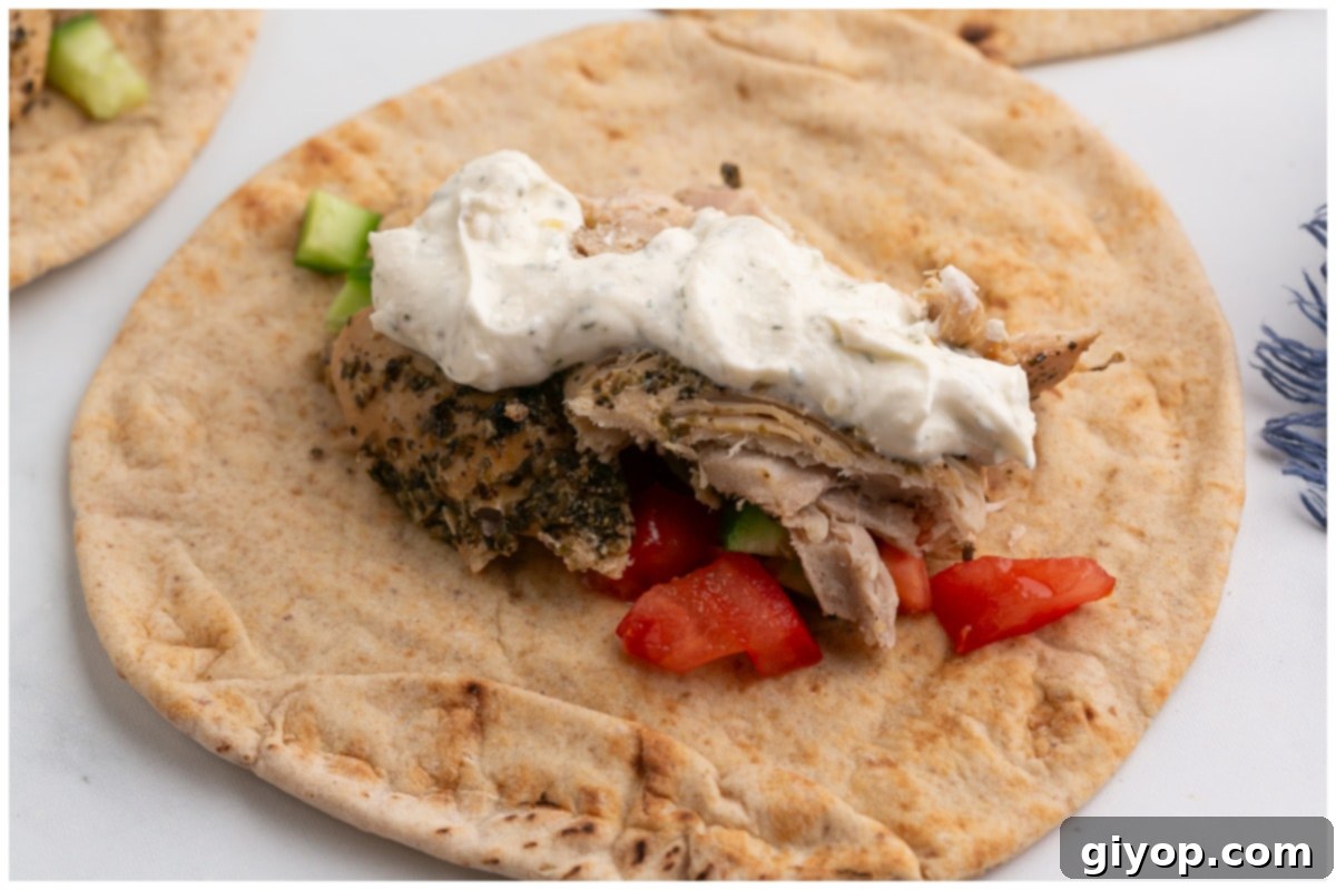Set-It-and-Forget-It Chicken Gyros 9 Warm pita bread generously topped with slow-cooked chicken gyro meat and fresh toppings.