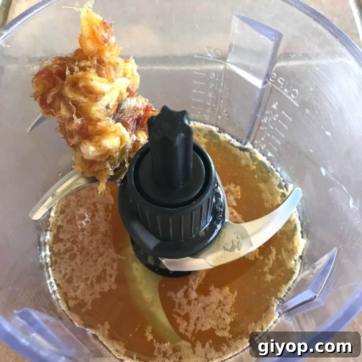 Velvet Date Caramel 6 Step3 of making caramel: processing the hot syrup with date paste in a small food processor.