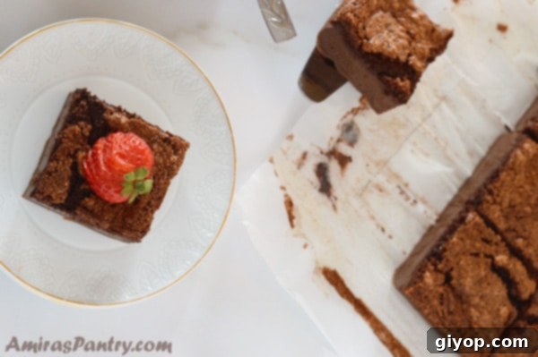Close-up of a whole Chocolate Magic Cake, showcasing its beautiful, slightly cracked top and rich chocolate color.