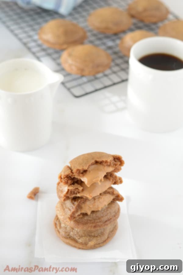 A close up of a peanut butter cookies and a cup of coffee