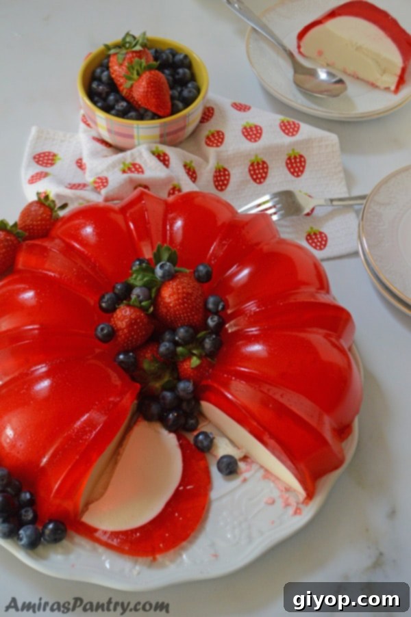 A plate of food on a table, with Jello and cream cheese