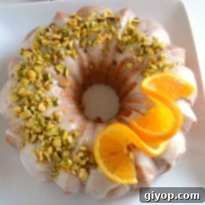 Golden Saffron Orange Bundt 2 Orange Bundt Cake with Saffron and Turmeric, featuring a vibrant golden hue and delicate texture.