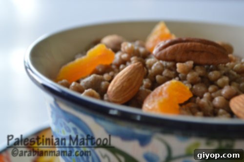 A close-up shot of freshly prepared Maftoul grains, showcasing their varied yet perfect textures