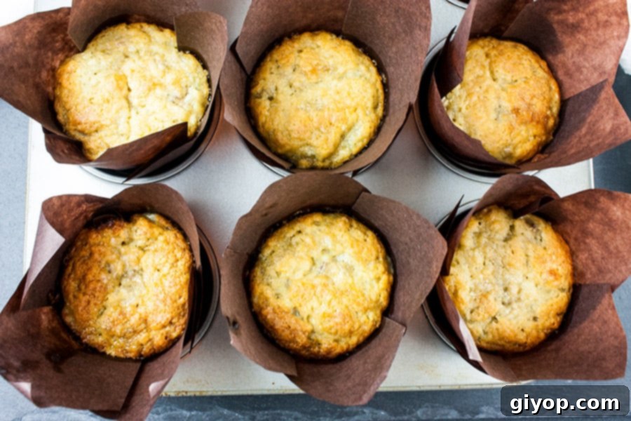 Irresistible Banana Muffins 4 Best Ever Banana Muffins baked in brown liners, golden brown and perfectly risen.