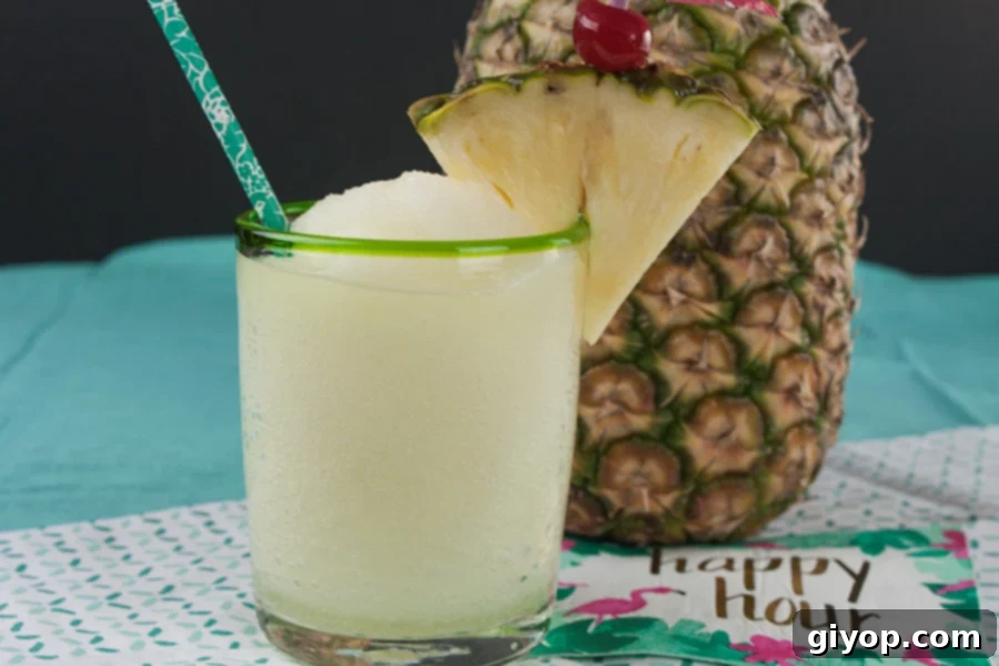 Paradise Pandemonium 2 Jamaican Me Crazy Cocktail with a pineapple garnish in a short glass.