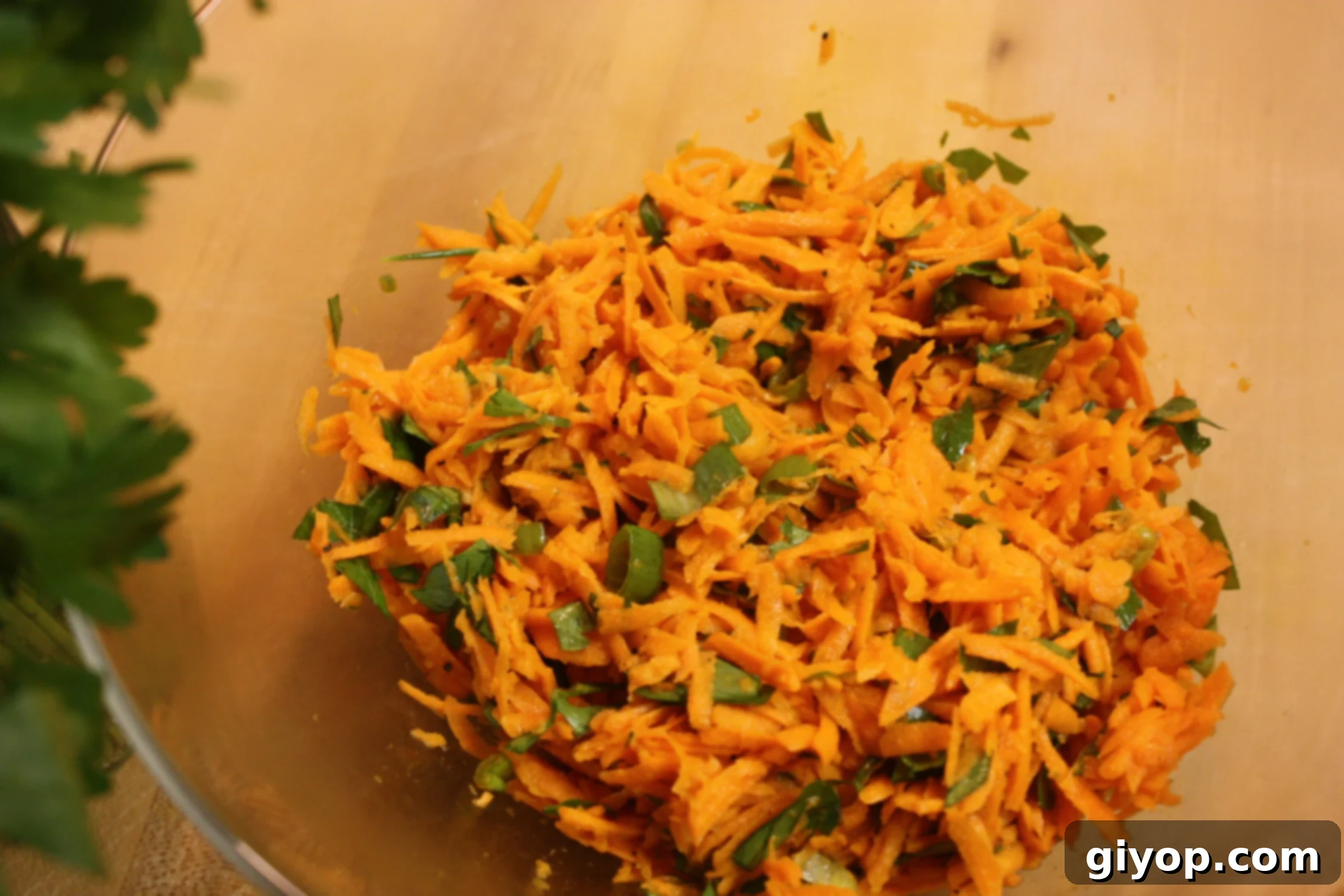 Savory Carrot Salad on a cutting board.