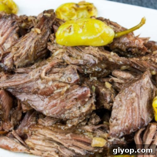 Melt-in-Your-Mouth Mississippi Pot Roast 7 The finished Crock Pot Mississippi Pot Roast, ready to be served.