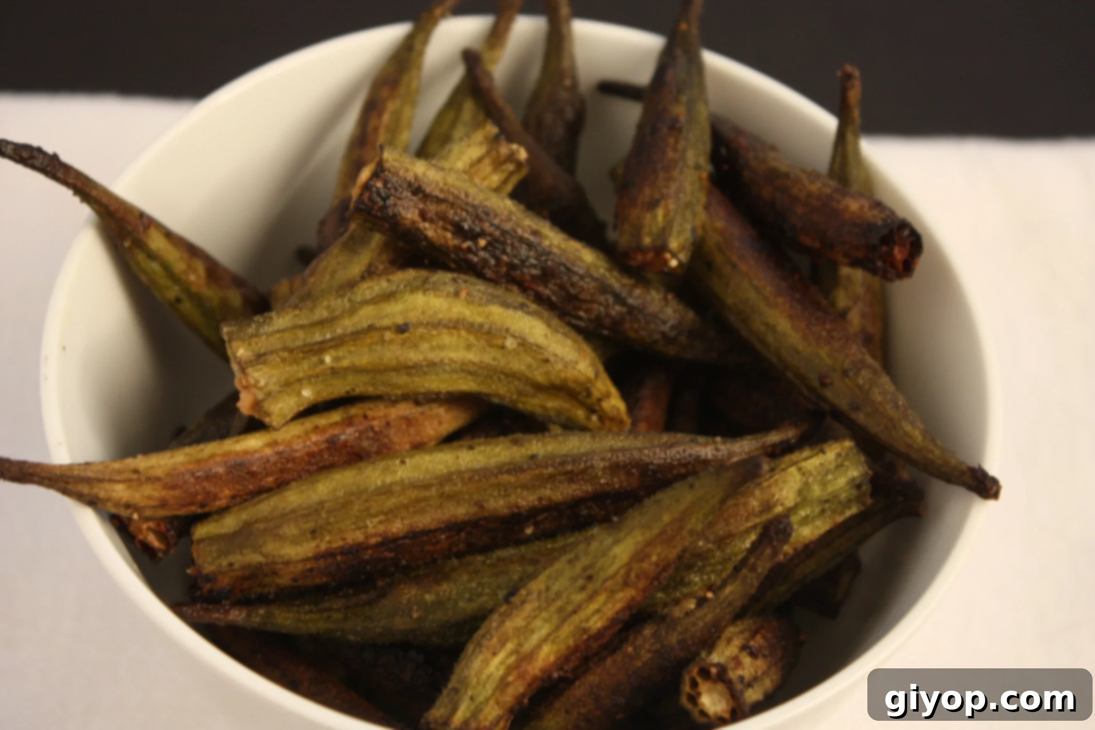 Crispy Okra Bites 2 This Roasted Okra recipe allows it's natural flavor to shine. Not slimy, crispy, and delicious.