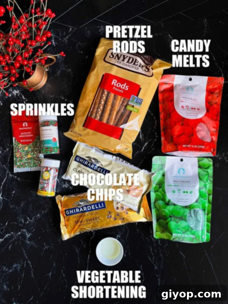 Chocolate covered pretzel rods ingredients on a sark surface.