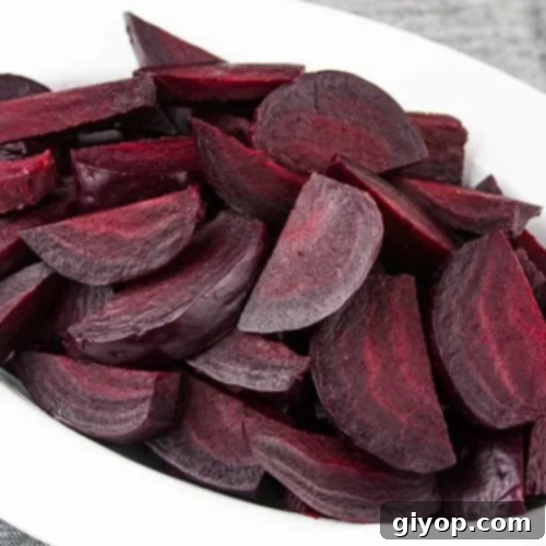 Ninja Foodi fresh beets in an oval white bowl.