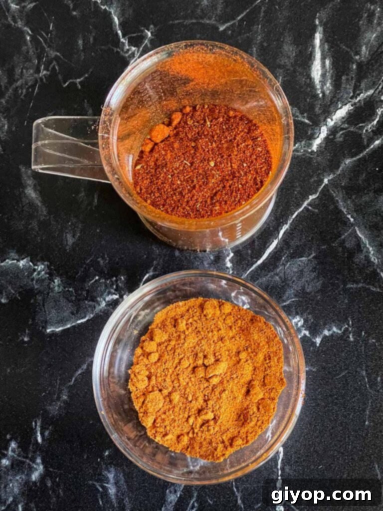 A bowl of Memphis style dry rub next to a small pile of finely ground finishing dust, ready to elevate the flavor of smoked ribs.